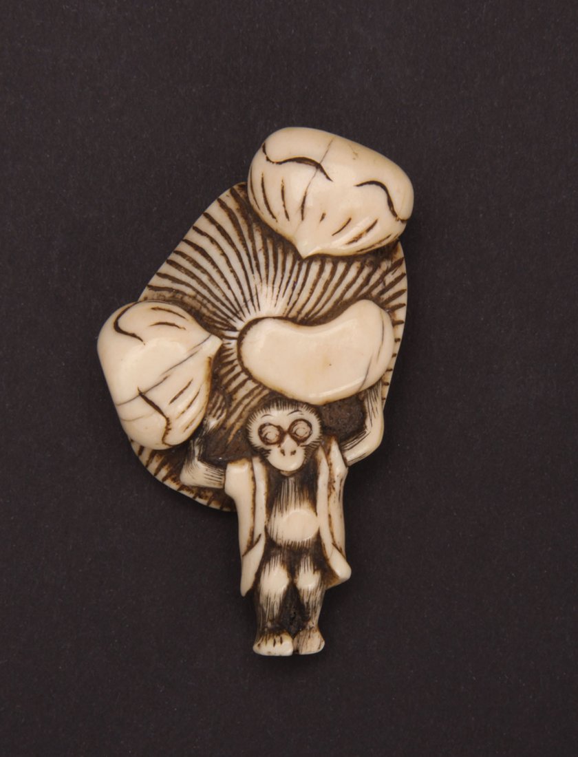 Japanese Netsuke of a Monkey holding a Mushroom