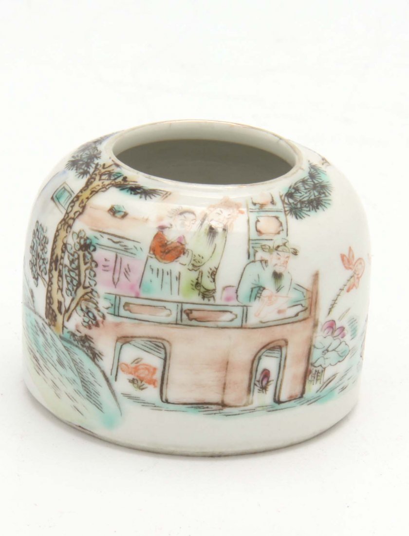 A SMALL CHINESE PORCELAIN BRUSH WASHER: Decorated in famille rose enamels of figures in a boat. Tongzhu (1861-1875) mark. Dia. 6cm.