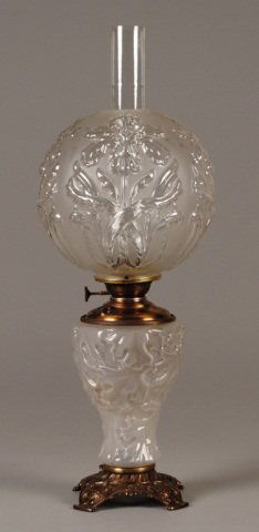 Gone-With-The-Wind Oil Lamp: frosted glass, iris pattern, wick stem mkd Success, 25"h (globe w/minor base crack, missing metal band at top of globe) Provenance: Joe L. Worley Estate, Bethel, NC