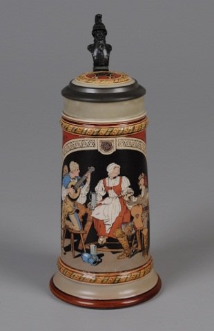 Mettlach Stein: .5L, 2692, etched, inlaid lid, tavern scene, barmaid and drinker (very small chip outside rim & body interior w/light staining) Provenance: Dennis Galloway Estate, Etowah, NC