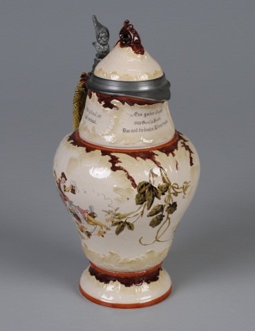 Mettlach Stein: 3.2L, 953(2183), PUG, inlaid lid, Gnomes drinking, by Schlitt (very small chip inside rim) Provenance: Dennis Galloway Estate, Etowah, NC