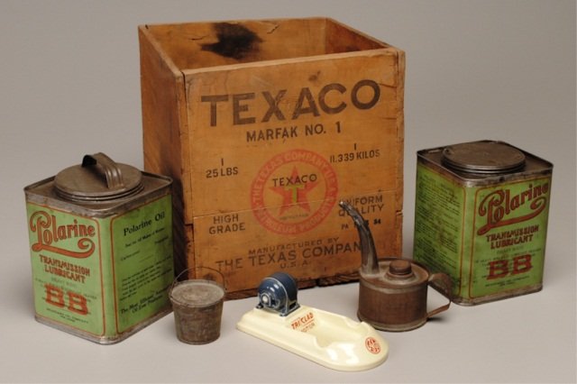 Six Pieces Motor Lubricant Advertising: Texaco Marfak No. 1 wooden crate, 25 lbs., 11-1/2 x 11-1/4 x 12"; two "Polarine Transmission Lubricant" tins, Standard Oil Co, 6-1/2 x 5-1/4 x 5-1/4"; "Mica Axle Grease" pail, Standard Oil Co, 2-1/4"h