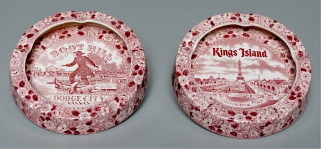Two Souvenir Red & White Transferware Ashtrays: mkd Fine Staffordshire Ware by Enco National, made in England: "Kings Island, International Plaza" and "Boot Hill, Dodge City, Kansas", 7"dia Provenance: Joe L. Worley Estate, Bethel, NC