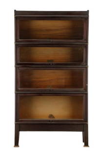 Globe Wernicke Barrister Bookcase: Globe Wernicke Company (American, Ohio, 1893-1987), first quarter 20th century. A barrister or 'elastic' bookcase, having four stacking sections, each with brass banding and glass door lifts, on a pla