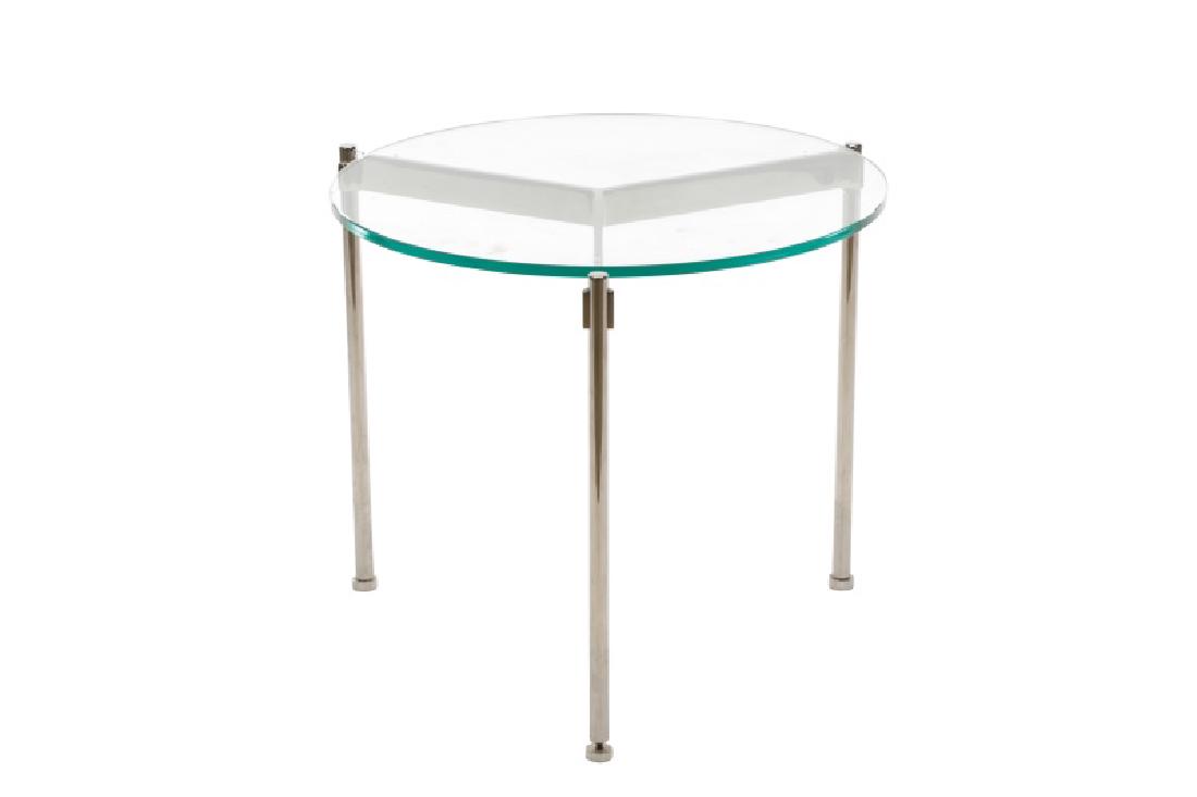 Ward Bennett Chromed Metal & Glass Side Table: Attributed to Ward Bennett (American, 1917-2003) for Herman Miller (American, founded 1923). A chromed metal side table, having a round glass top. Apparently unmarked. Approximate height 16", diameter