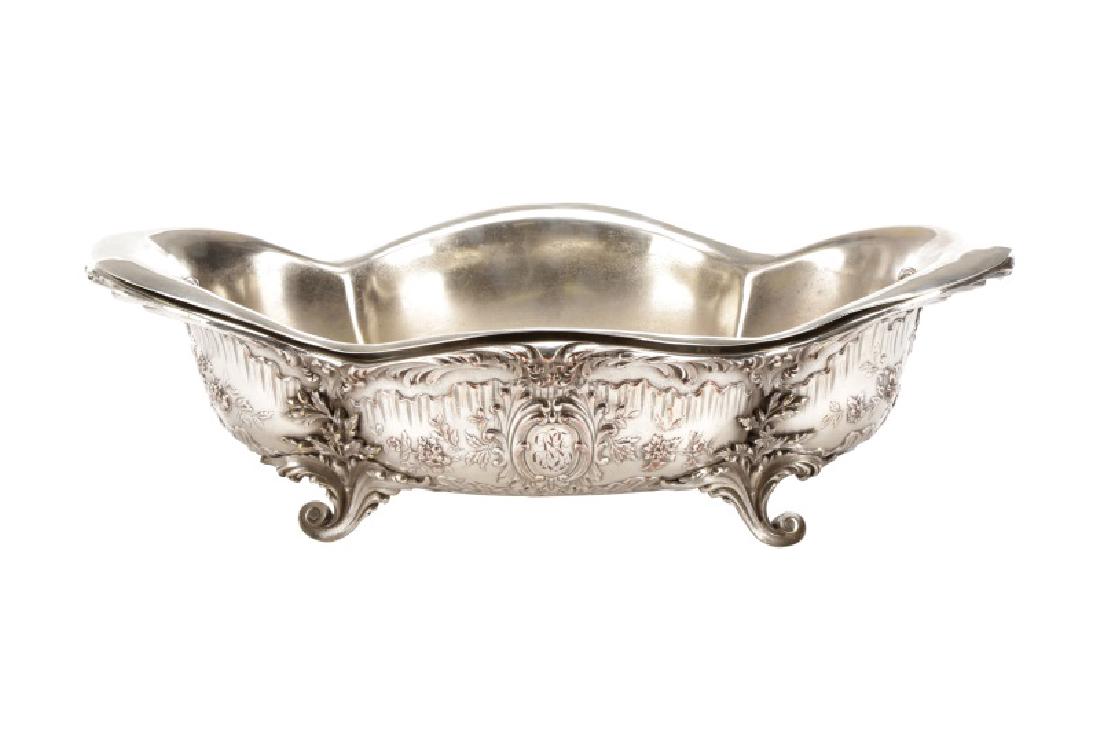 Continental Silver on Copper Jardiniere w/Liner: A Continental silver on copper jardiniere in the rococo style having a oval shape with flaring sides extensively chased and repousse with scrolls, shell work and foliage and fitted with conforming rin