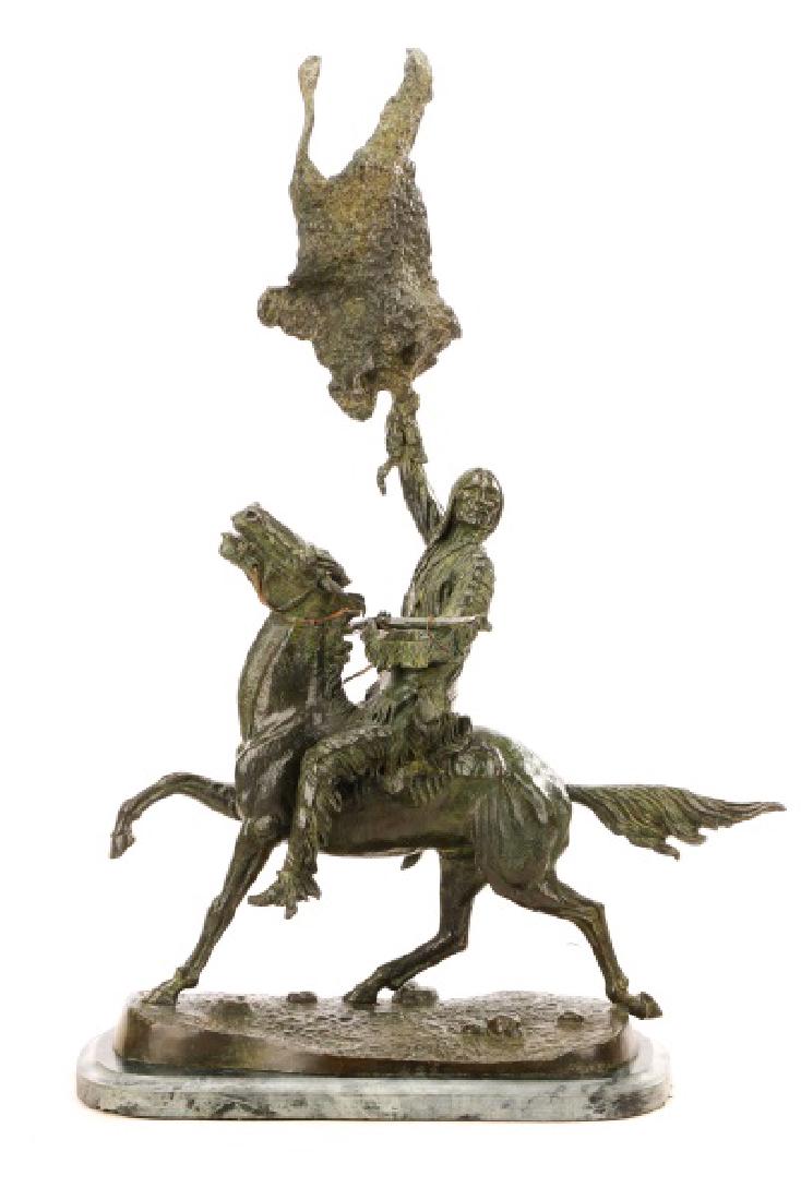 After Frederic Remington, "Buffalo Signal", Bronze: After Frederic Sackrider Remington (American, 1861-1909), "Buffalo Signal", bronze. A 20th century patinated cast bronze sculpture with striated green marble base after the original work depicting a N