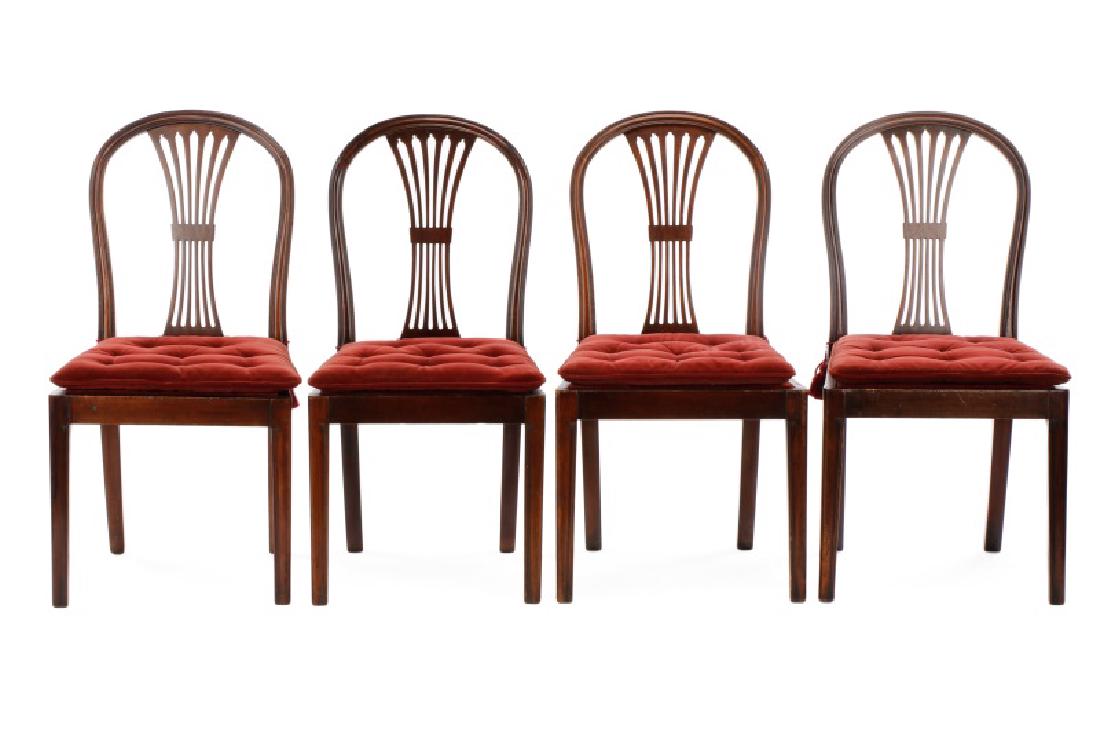 Set of 4 Edwardian Hepplewhite Side Chairs: English, early 20th century. Set of four Edwardian (1901-1914) matching mahogany wood framed rounded back Hepplewhite side chairs with pierced back splat above trapezoidal seat with burgundy or wine v