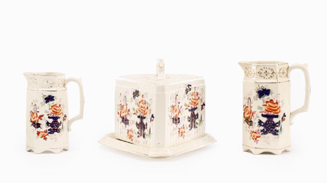 19th C. English Imari Ironstone, Pitchers & Cheese: English, 19th century. A group three English Imari ironstone serving pieces in pattern "China Boquet" comprising large and small hexagonal water or wine pitchers, and a covered cheese server of wedge 