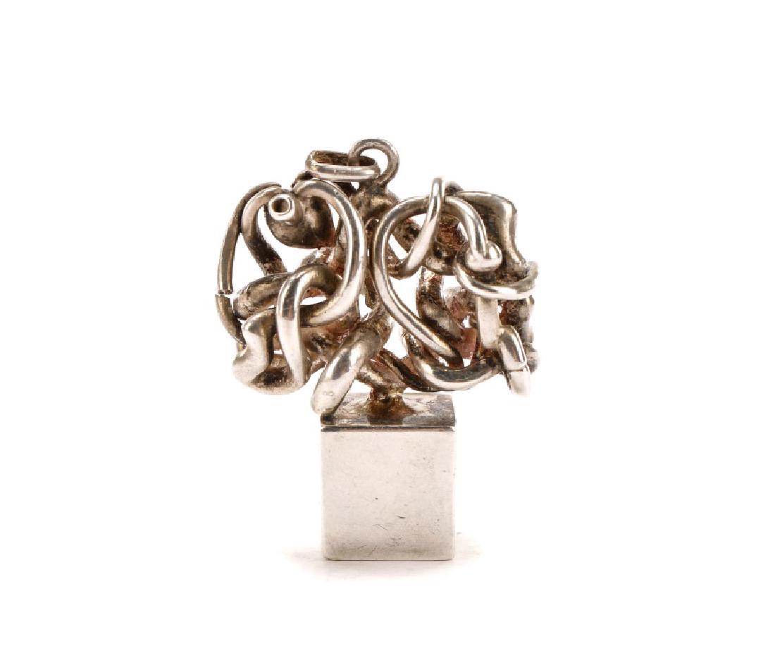 Miguel Berrocal "Micro Mento" Sterling Sculpture: Miguel Berrocal (Spanish, 1933 - 2006), "Micro Mento", circa 1976. A sterling silver sculpture entitled "Micro Mento"; a miniature of Berrocal's sculpture "Homage to Piccasso". Sculpture has a bale at