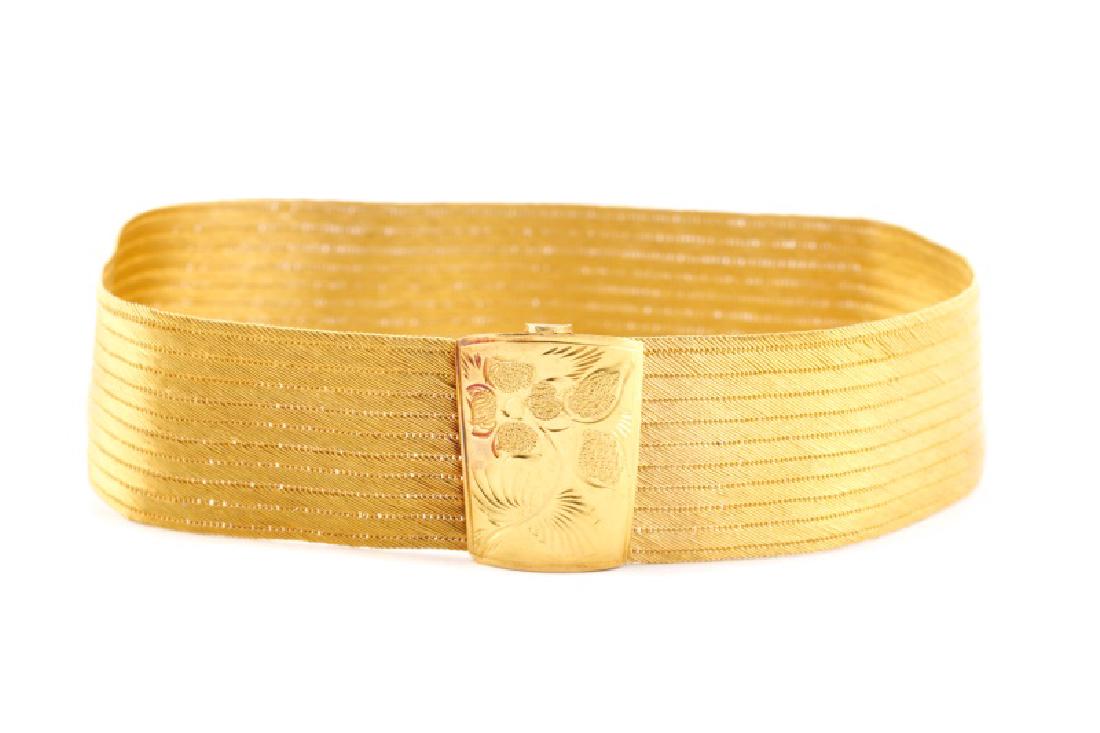 Woven 22k Yellow Choker w/ Engraved Floral Clasp: An estate 22k yellow gold choker, having a wide woven band and a handmade floral clasp engraved with a floral motif. Marked with maker's trademark AVCIN and 916, acid tested as 22k quality. Length 12"
