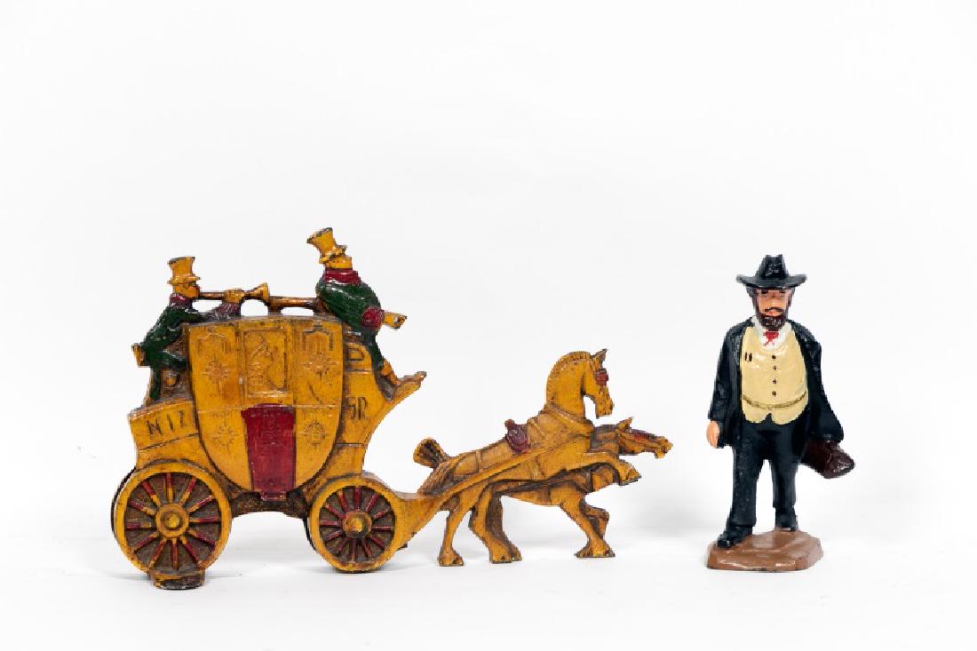 Two Cast Iron Doorstops, One Charles Tuteur (1 of 5)