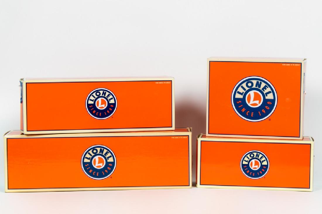 Four Lionel Train Cars in Boxes, One Holliday Pack (1 of 5)