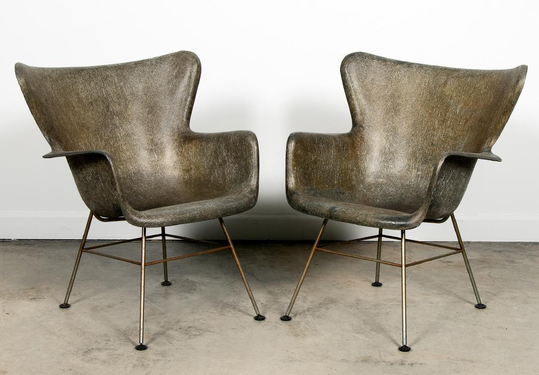 Pair, Lawrence Peabody Fiberglass Shell Chairs: Lawrence Peabody for Selig, mid 20th century A pair of fiberglass shell armchairs with metal legs Unmarked Approx. h. 33", w. 26.5", d. 17.5"