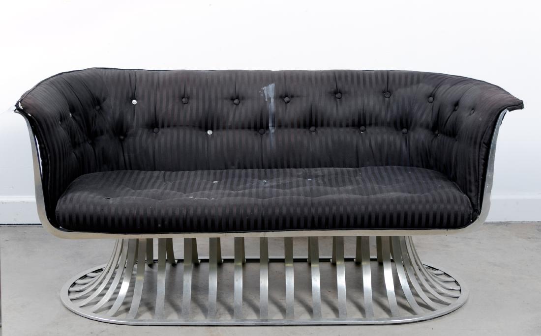 Russell Woodard Aluminum Settee, Striped Fabric: Woodard Furniture Co., Russell Woodard, 1960's. A aluminum down swept stalled frame settee with black cushions. Unmarked. Approx. h. 27", w. 62", d. 28"