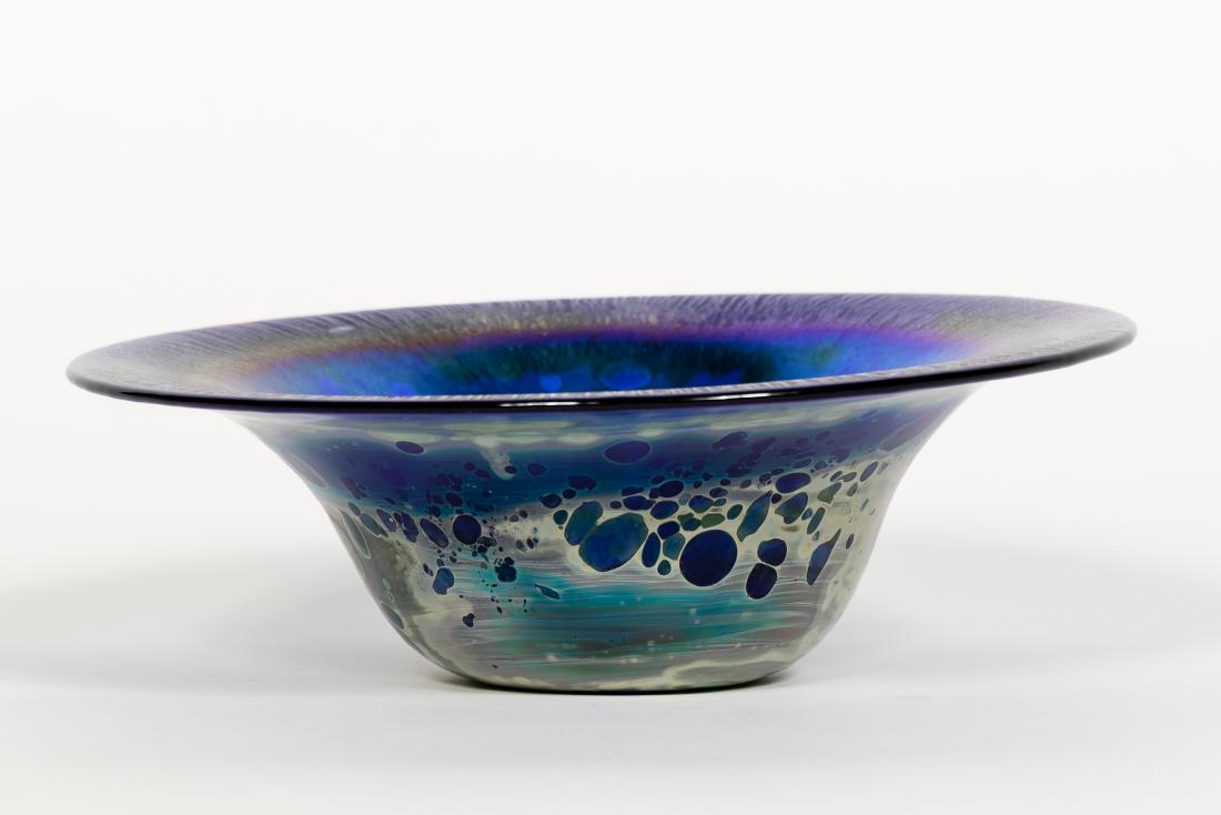 Roger Roland Correia Art Glass Bowl: Correia Art Glass (American, founded 1973), circa 1973. Electric cobalt blue art glass bowl with stretch or onion skin decor. Signed "Roland Correia 8-73 ?0802". Approx. height 3", diameter 9.87". Not