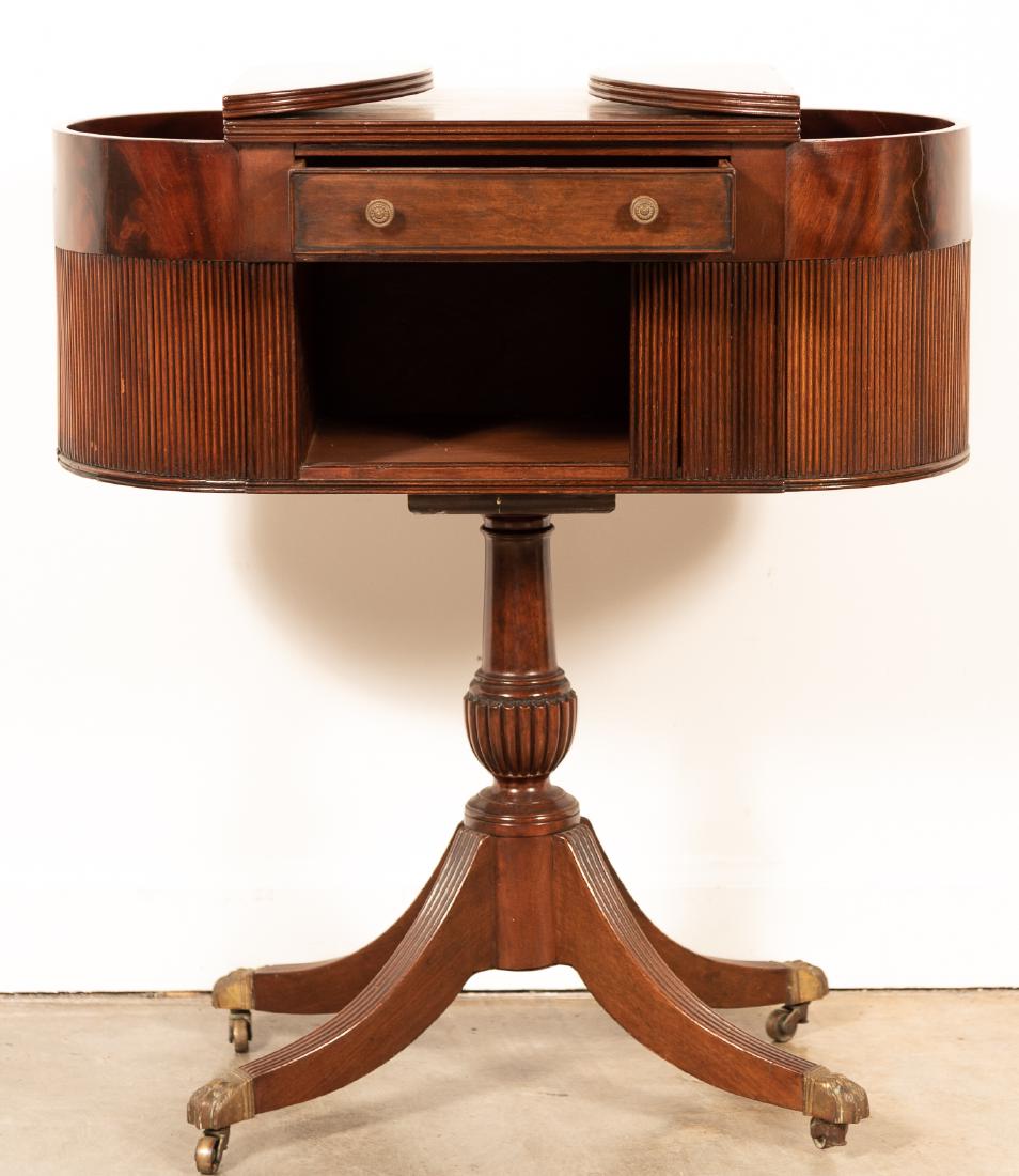 Late 19th c. Federal Style Mahogany Work Table: American, 19th century A Federal Style mahogany work table with two side compartments and one drawer over a tambour door, attributed to the workshop of Duncan Phyfe. Approx. H. 31", W. 28", D. 14.5"