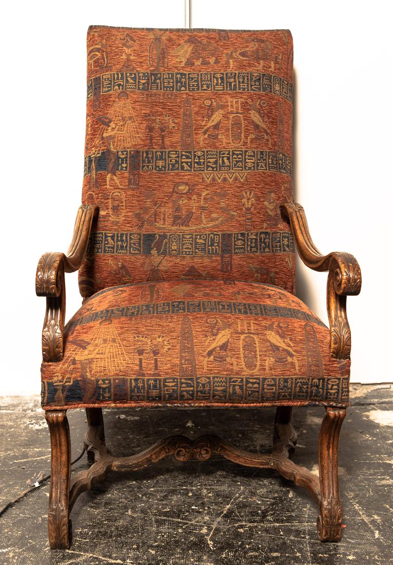 French Louis XIV Style Fauteuil: French, A Louis XIV style fauteuil with an upholstered back and seat with bill head-arms and H-shaped mutton-bone stretcher. Approx. H. 46.5", W. 23", D. 32"