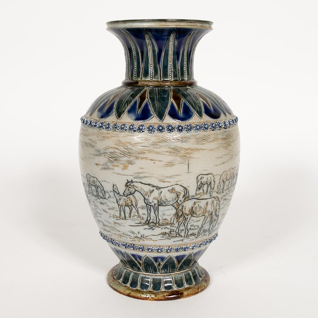 Doulton Lambeth, Hannah Barlow Horse Vase: Doulton Lambeth, Hannah Barlow (1851-1916) Horse Vase. Incised Sgraffito decorated vase with 13 horses in a landscape, cobalt, dark green and brown leaf borders with blue rosette bands. Signed on base