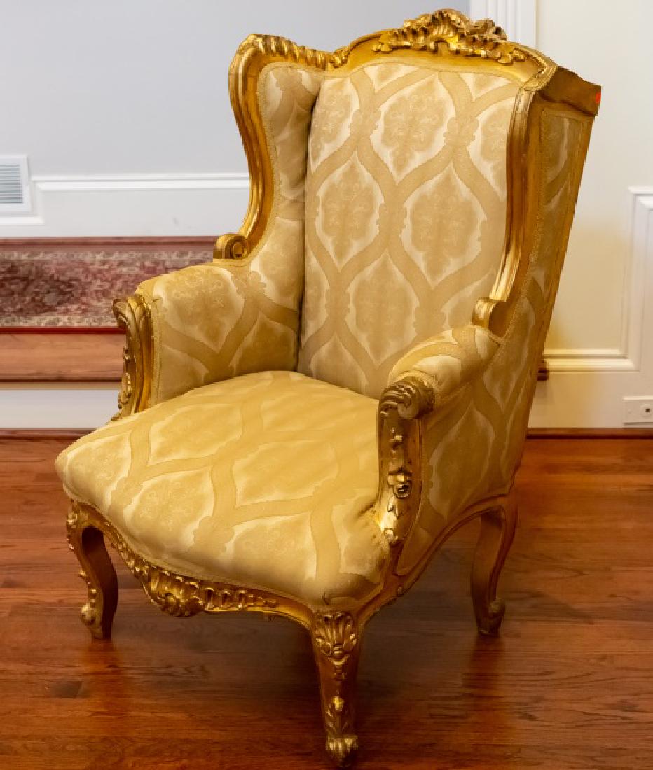 Pair, Louis XV Style Giltwood Winged Bergeres: French, 20th C. Pair of Louis XV style upholstered and giltwood carved winged bergeres, both with carved crest flanked by wings and raised on cabriole legs. Approx. height 45.5", width 29.5", seat hei