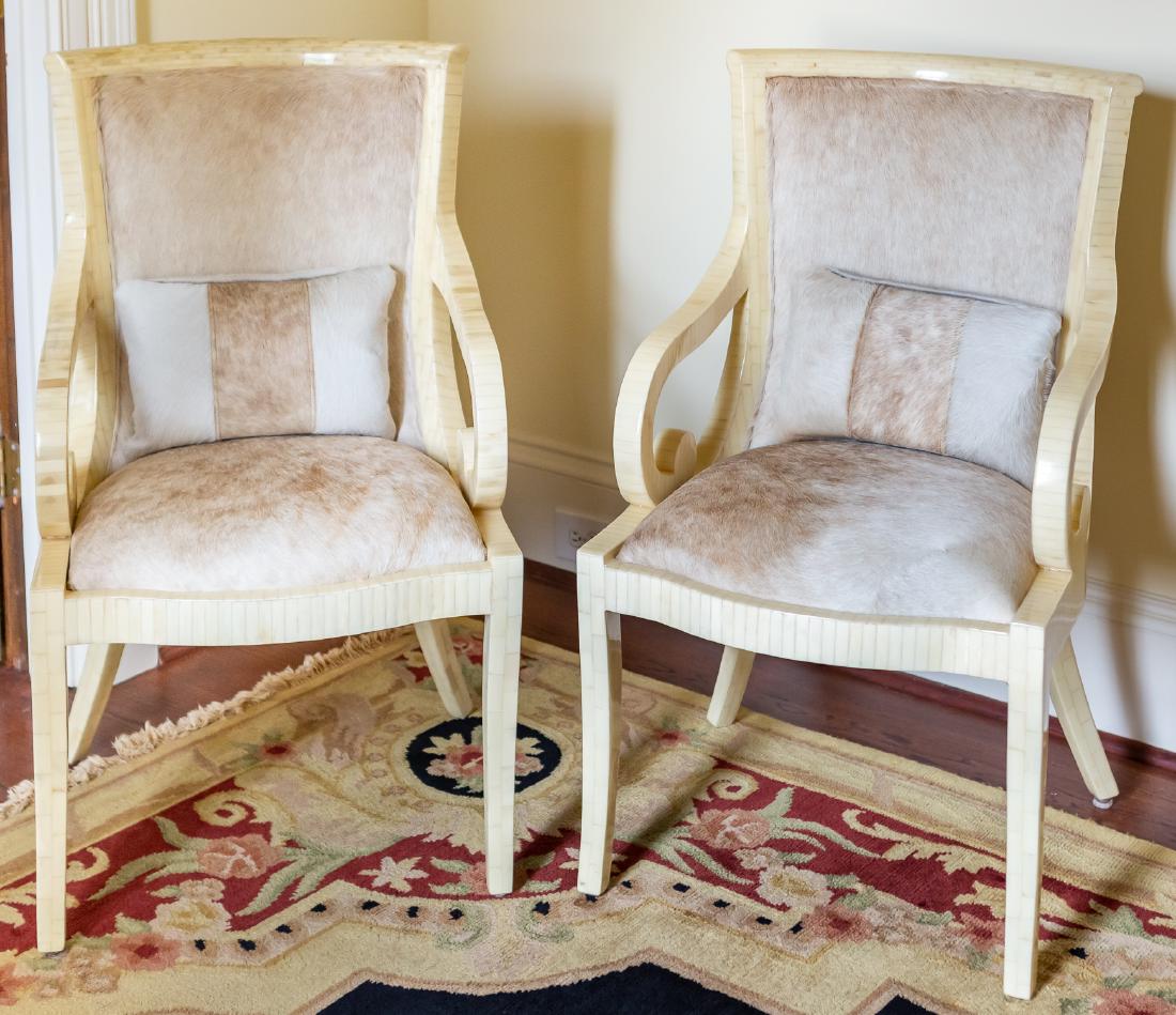 Pair, Modern Tessellated Bone Armchairs: Attributed to Enrique Garcel (20th C), third quarter 20th c. A pair of tessellated bone armchairs covered in animal hide, in the manner of Karl Springer. Approx. height 39.5", width 22.5" (arm to arm)