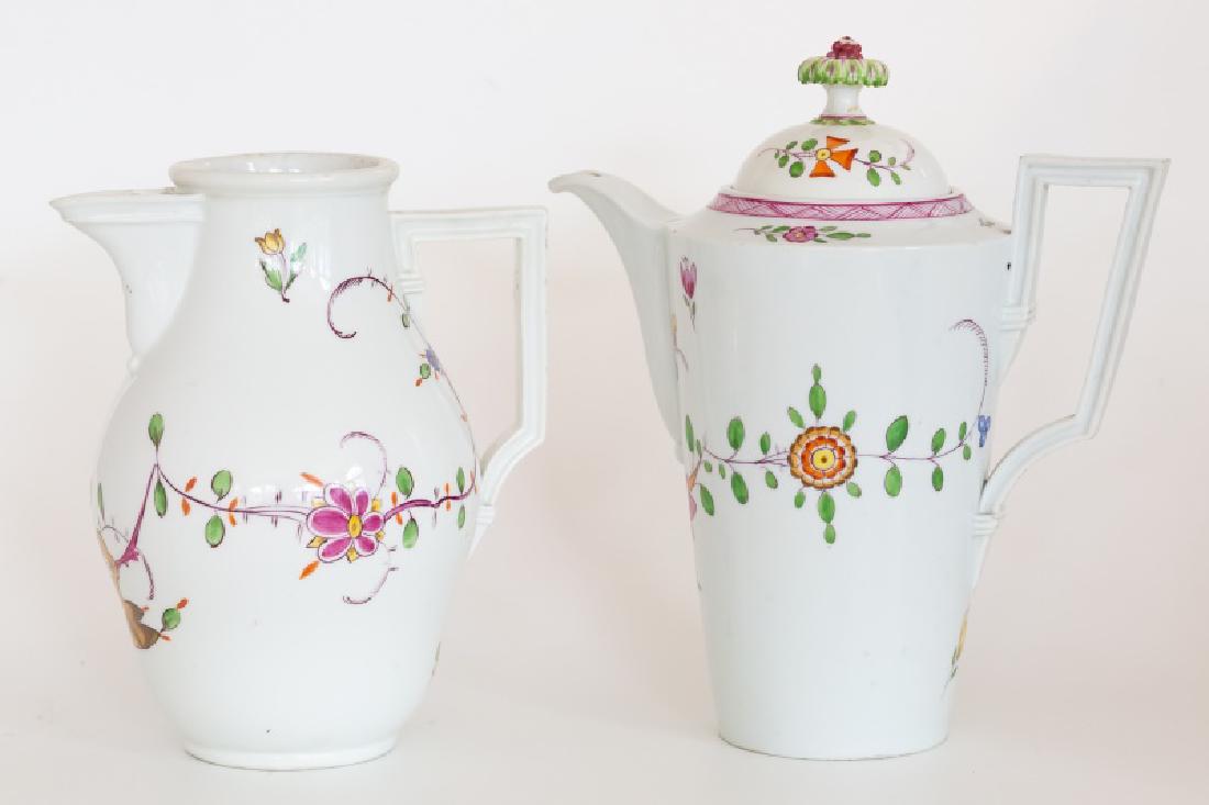 Group, Sixteen Porcelain Table Accessories: Group of sixteen porcelain table accessories comprising Meissen style coffee pot, Meissen style pitcher, four porcelain tea cups with six matching saucers, Royal Copenhagen "Bicentenary" plate, limite