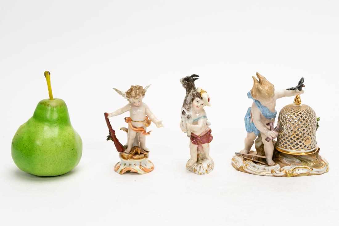 Three German Porcelain Cherub Figurines: Three 19th Century German Porcelain Figurines; 1) signed Meissen, putti placing bird in gilded cage, 2) signed KPM (torch mark) of boy with goat and 3) signed Richard Eckert & Co., cherub with gun and