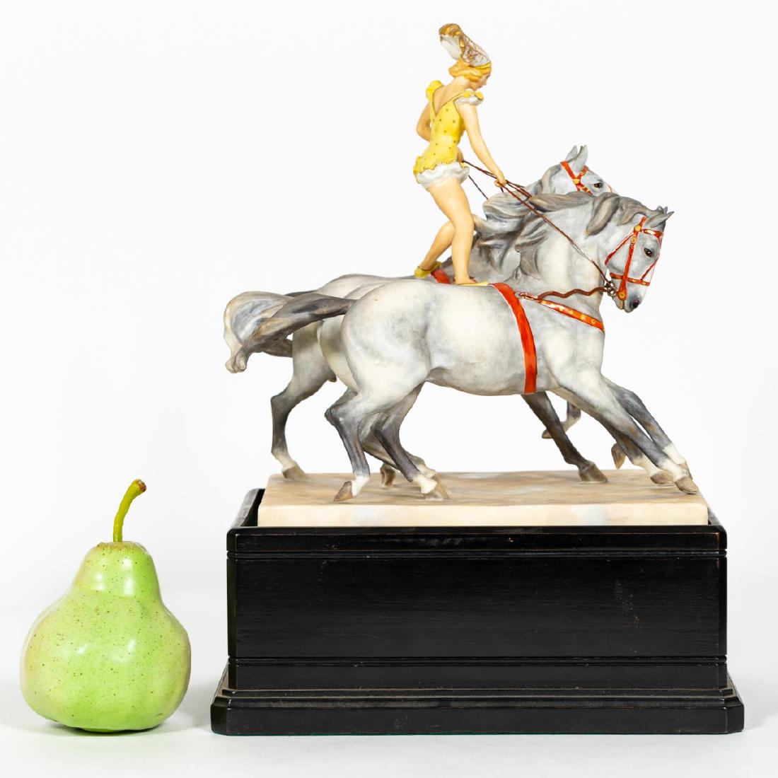 Doris Lindner, Royal Worcester In the Ring Figure: Doris Lindner (British, 1896-1979) for Royal Worcester (English, founded 1751). A figural group "In the Ring" #3180, bisque porcelain figurine. Marked on underside. Approx. height 10.75" (without base