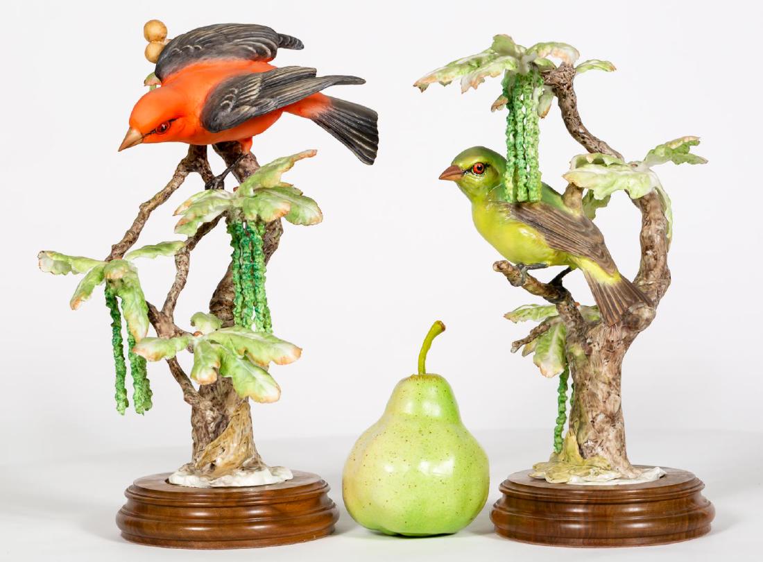 2 Dorothy Doughty Scarlet Tanager Porcelain Birds: Dorothy Doughty (Italian, 1892-1962) for Royal Worcester (English, founded 1751). A pair of Scarlet Tanger porcelain bird figurines. Marked on underside. Approx height with stand 12.25". Provenance: F