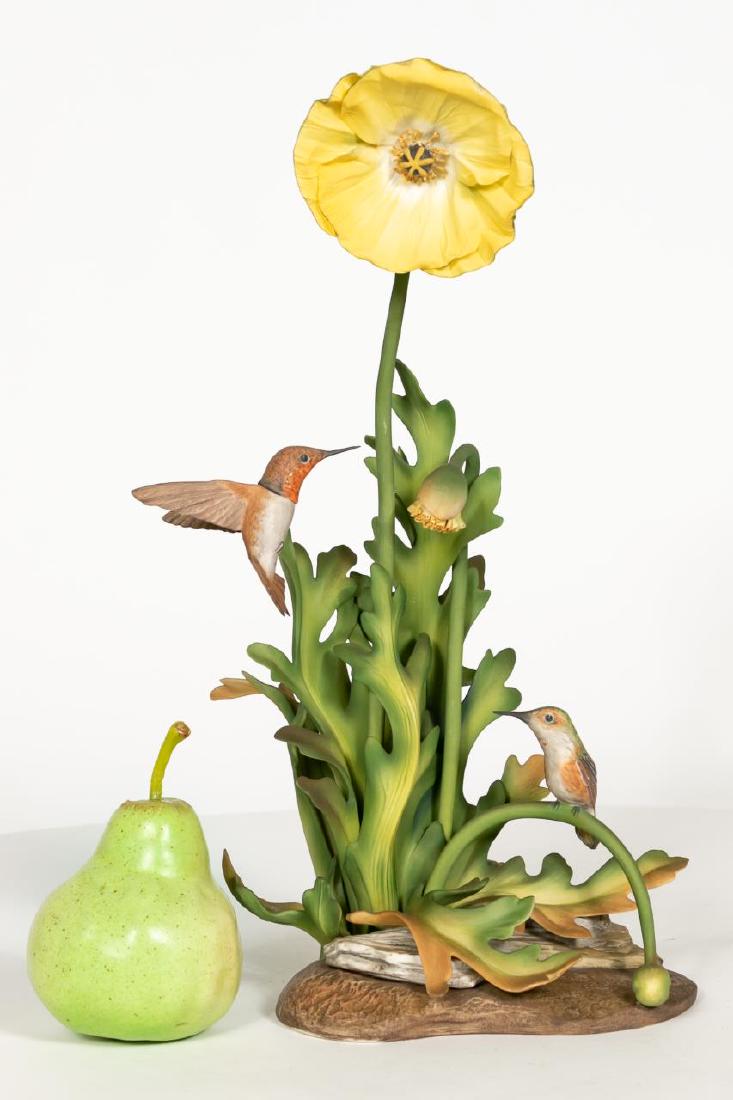 Boehm Porcelain Rufous Hummingbirds Figurine: Boehm (American, founded 1953). A limited edition hand painted porcelain sculpture of Rufous Hummingbirds (483) with two detachable flowers. Limited edition of 500. Marked on underside, 487. Approx. h