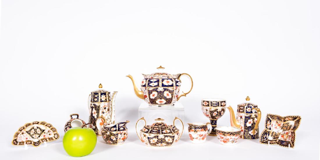 Royal Crown Derby "Traditional Imari", 11PCS: Pattern discontinued 2014, Royal Crown Derby (English, founded 1750); bone china; "Traditional Imari" pattern 2451; blue and rust florals embellished with gold; consisting of a 7" coffee pot, 5.5" ind