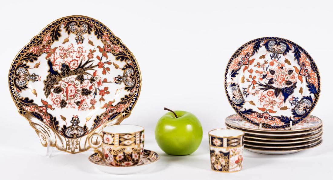 19th and 20th C. Royal Crown Derby Imari Tableware: 11 pieces, Royal Crown Derby (English, founded 1750); gilded blue and rust floral bone china; consisting of a shell dish (marks for 1877 - 1890), six bread plates (marks for 1877 - 1890 and 1886; toge