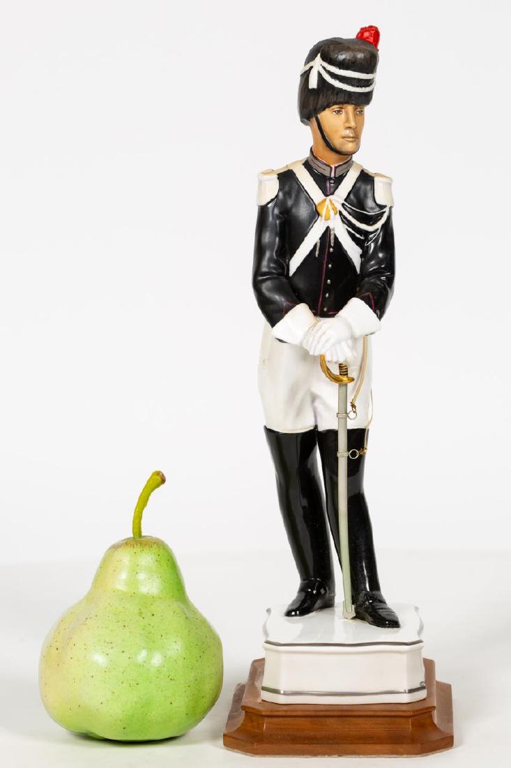 Royal Worcester, Papal Gendarme, w/ Base: Royal Worcester (English, founded 1751). A "Papal Series: Papal Gendarme" bone china figurine on base; modelled by Neal French; number17. Marked on underside. Approx. height on stand of 13.25". Proven