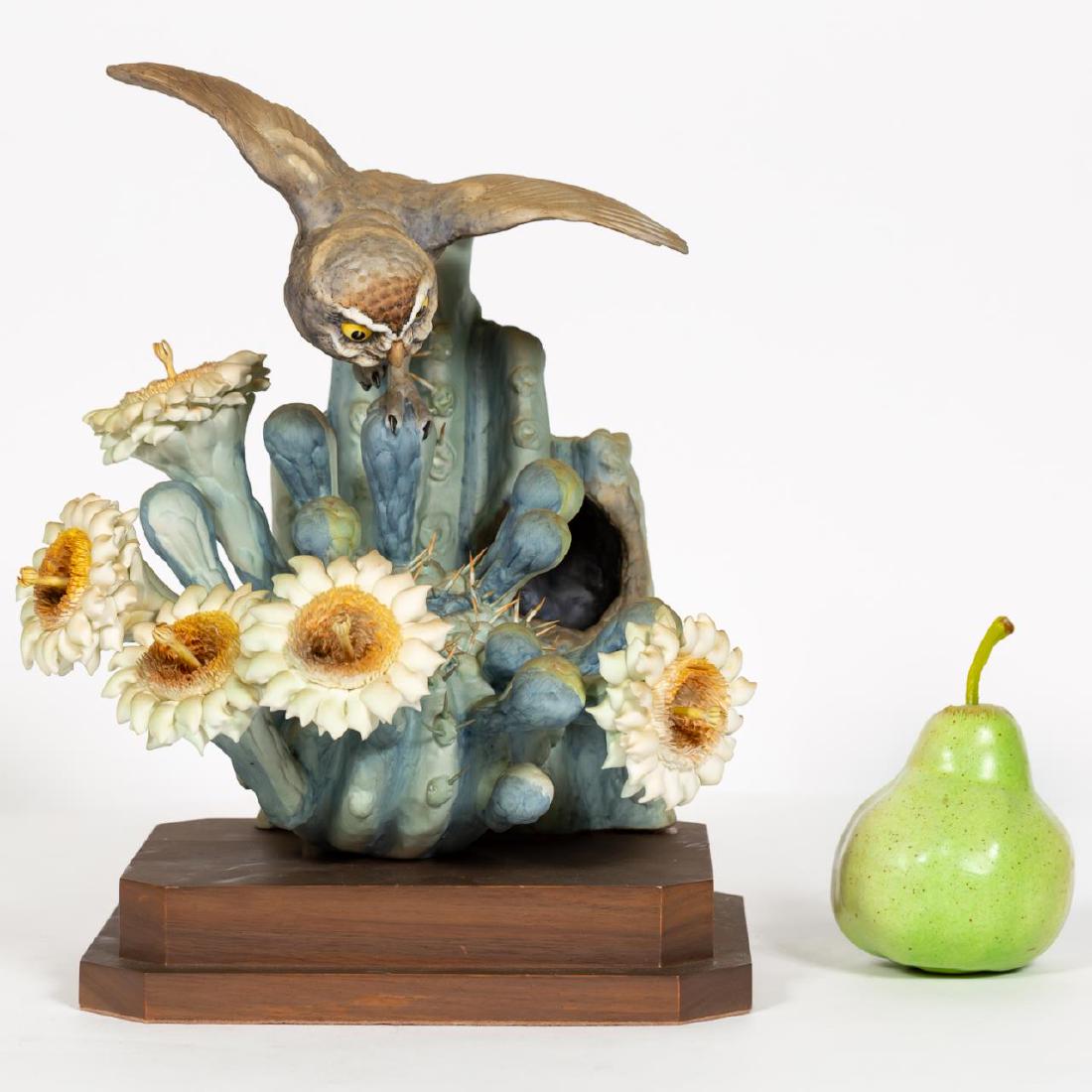 Dorothy Doughty Elf Owl on Wooden Stand: Dorothy Doughty (Italian, 1892-1962) for Royal Worcester (English, founded 1751). Elf owl and Giant Saguaro. Hand-painted porcleian. Signed, and marked to underside. Approx height on stand 12.5". Prov