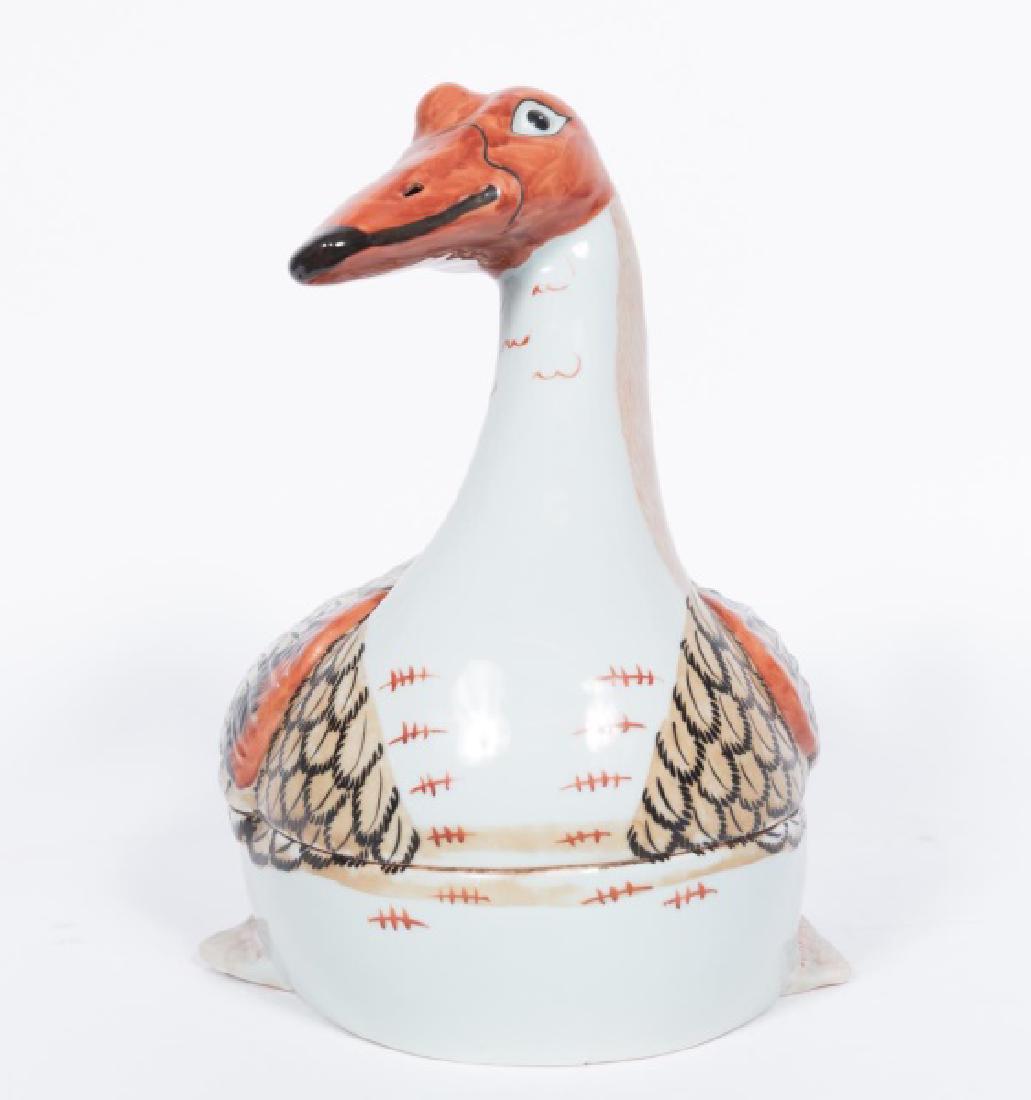 Chinese Export Style Porcelain Goose Tureen: Chinese export style porcelain 'goose' tureen hand painted with feathered detail in black, red and brown. Marked to bottom. Approx: 14.75" H x 15.5" W x 12.25" D.