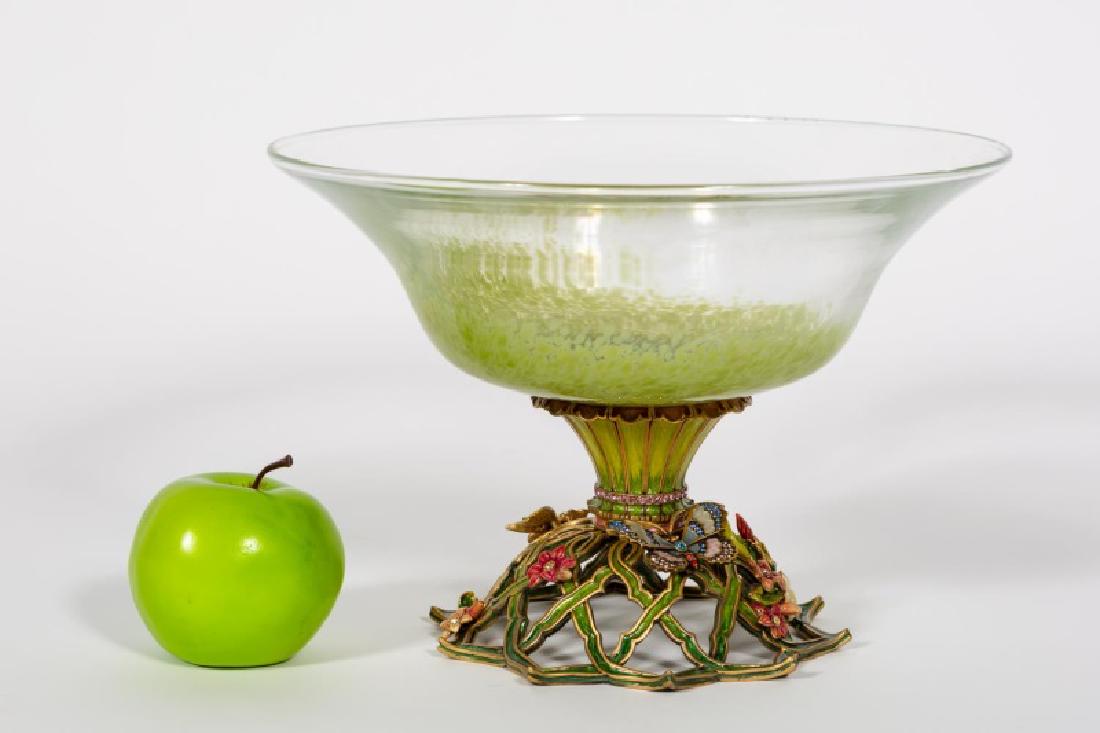 Jay Strongwater Magnolia Butterfly Pedestal Bowl: Jay Strongwater (American, 20th century). A two form featuring a flared blown glass bowl atop an enamel and Swarovski crystal decorated pedestal base accented by floral motifs and butterflies. Marked 
