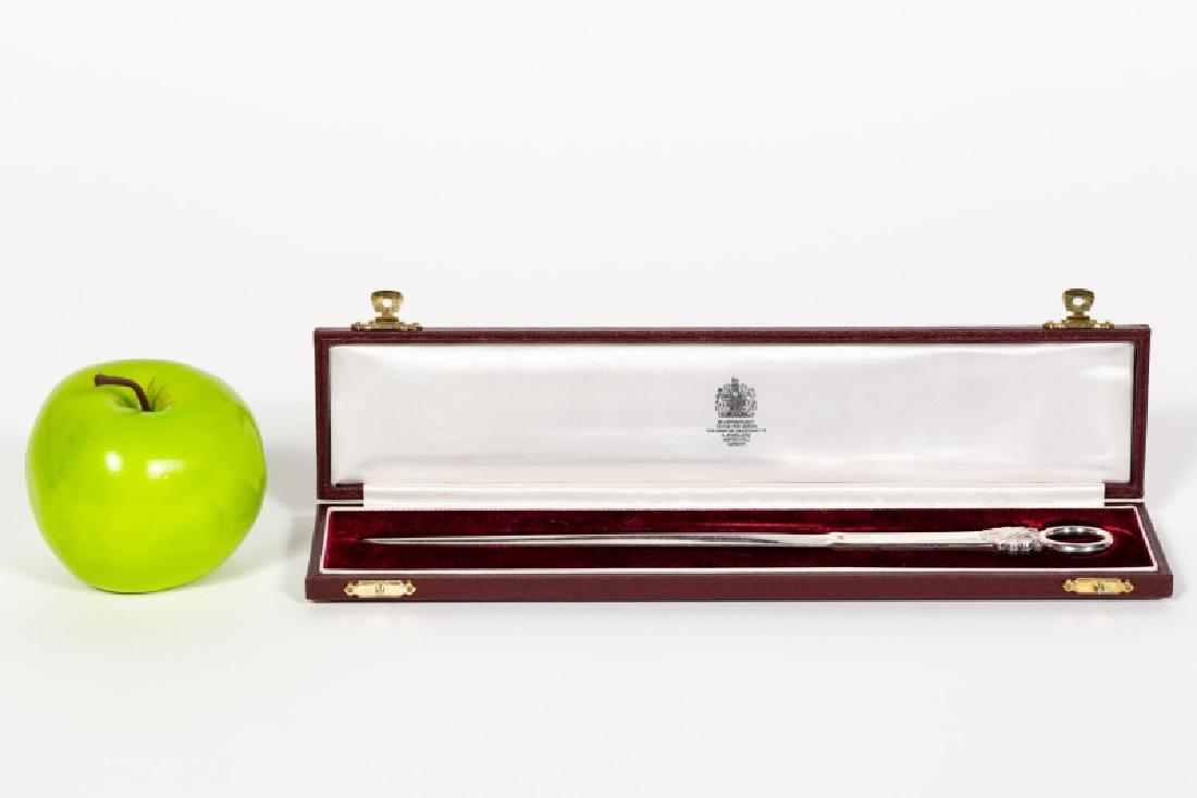 Asprey Sterling Silver Shell Letter Opener w/ Box: Asprey (English (London) founded 1781). A sleek sterling silver letter opener with shell detail. Marked on front and back, with maker's mark, assay office, silver standard, and date letter hallmark fo