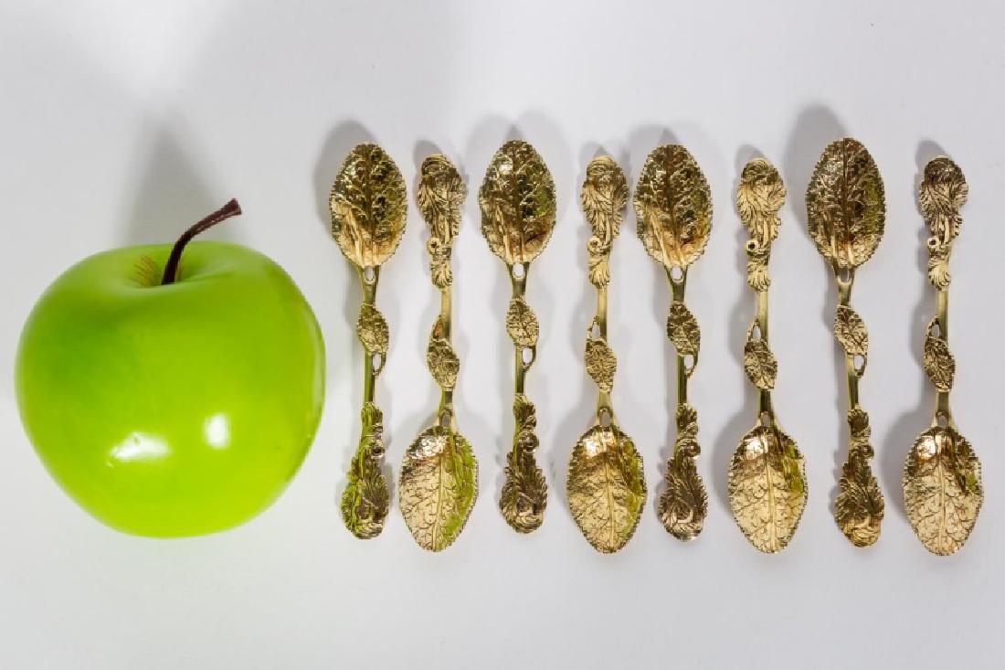 Set 8 Georgian Gilt Sterling Silver Leaf Spoons: 18th century, English, gilt sterling silver, set of 8 leaf & stem motif spoons. George III, makers mark only possibly for Thomas Dealtry (CA 1765). Leaf motif bowls with leaf and stem handles, engrave