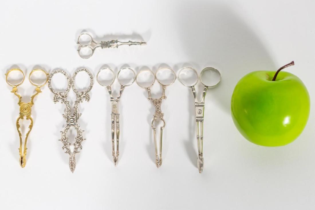 6 George III Silver Sugar Tongs/Nips, inc. Child: 8th/19th century, English, six sterling silver sugar tongs/nips. George III, includes 1 child's size, 1 gold washed, 1 ornate (Regency) and 2 "turned." Approx. 3" - 4.75" L, 4.745 ozt. Provenance: Fro