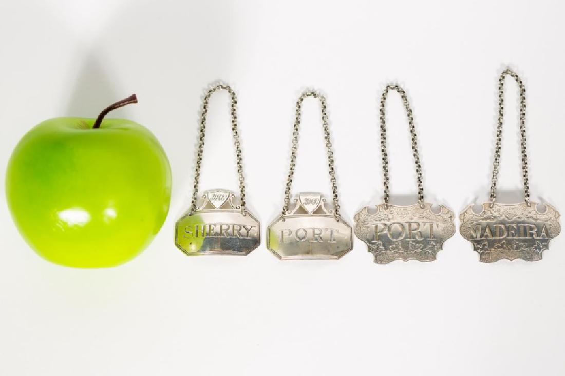 Two Pr. English Georgian Silver Bottle Tags: 18th century, English, two pair of sterling bottle tags. a] pr. shaped with grape leaf and vine engraving, Madeira & Port, signed Sandilands Drinkwater, London, CA 1750 (Approx. 1.25" x 2.375" W) b] p