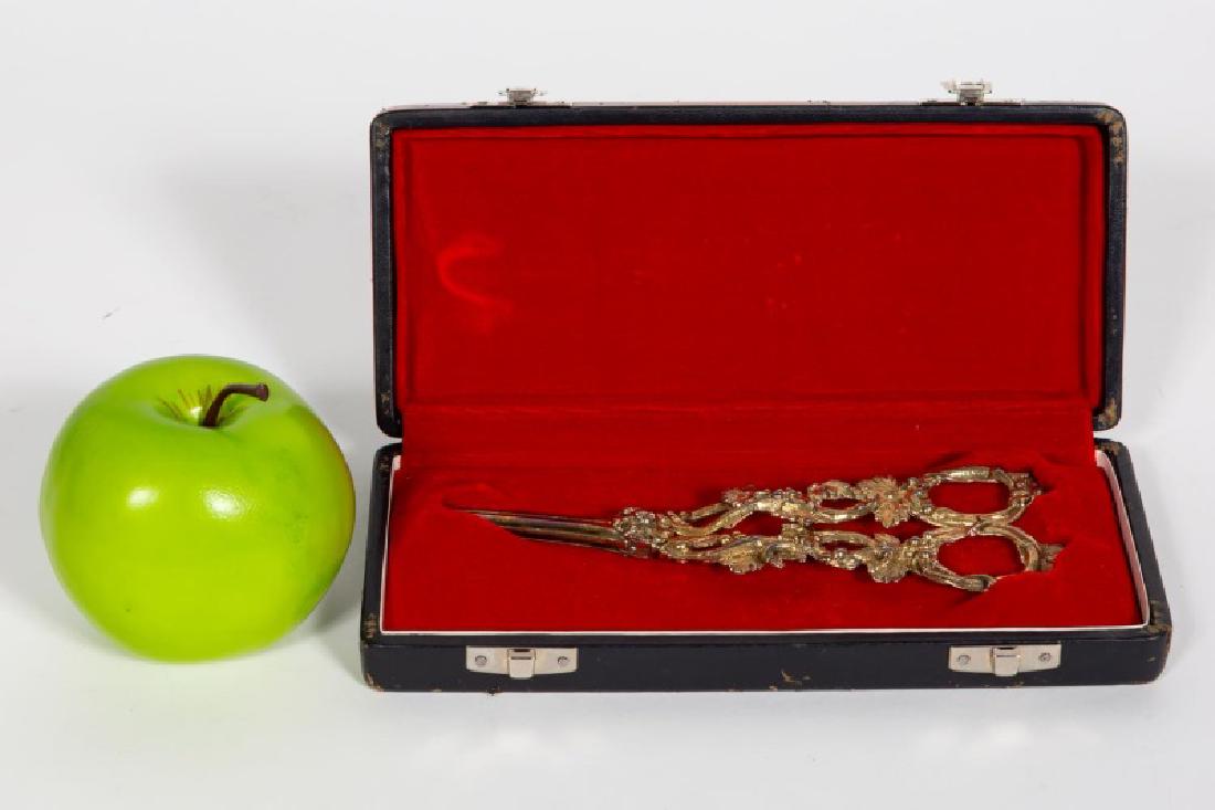 English Georgian Gilt Sterling Silver Grape Shears: 19th century, English, pair of Georgian gilt sterling silver grape shears. Hallmarked Birmingham, 1836, maker's mark for Joseph Willmore. Having cast grape vine motif handles. In modern black leather 
