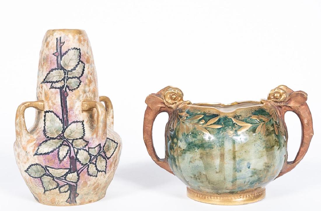 2 Amphora Art Nouveau Style Vases, Dolphin Handles: Amphora (Austrian, founded 1892), Turn-Teplitz, Bohemia, early 20th century. A group of two Art Nouveau style vases comprising of a gourd form with four handles and rounded from with dolphin handles.