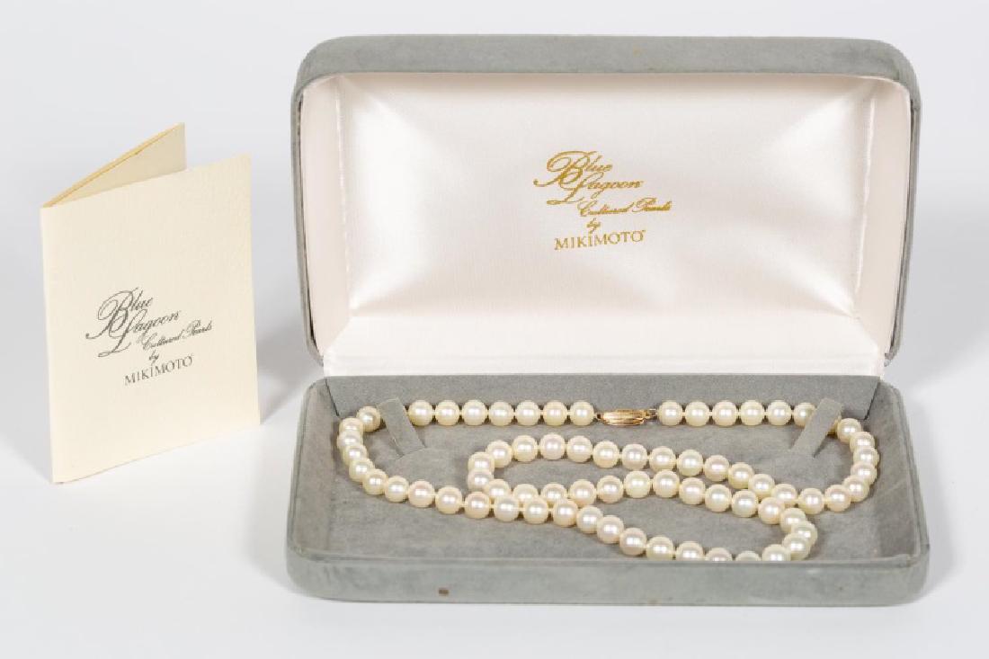 Blue Lagoon Stand of Cultured Pearls by Mikimoto: A fine strand of Blue Lagoon cultured peals by Mikimoto. The strand consists of seventy-one pearls that end with a "14K, BL" marked clasp. Approx: 24" clasp to clasp, pearls measure approx. 6.13mm and