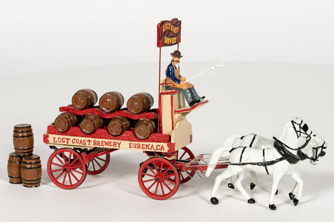 18 Pc, North Coast Miniatures Brewery Wagon: North Coast Miniatures (American, 20th century). A"Lost Coast Brewery" toy soldier brewery wagon.Marked to underside "North Coast Miniatures".Approx: (Measures box) w. 10.75". Provenance: From the Est