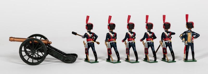 7 Pc, Tradition "French Napoleonic Cannoneers": Tradition (English, 20th century). A seven piecegrouping of French Napoleonic Cannoneer toysoldiers. Marked "Tradition" to underside. Approx:(measures cannon) w. 4.5". Provenance: From the Estate of C