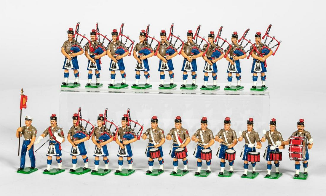 21 Pc, "US Marine Pipes and Drum Corps" Soldiers: STE (20th century). A complete set of twenty oneUS Marine Pipes and Drum Corps "Leatherneck" toysoldiers. Apparently unmarked. Approx: h. 2.25". Provenance: From the Estate of Charles Michael Cawley o