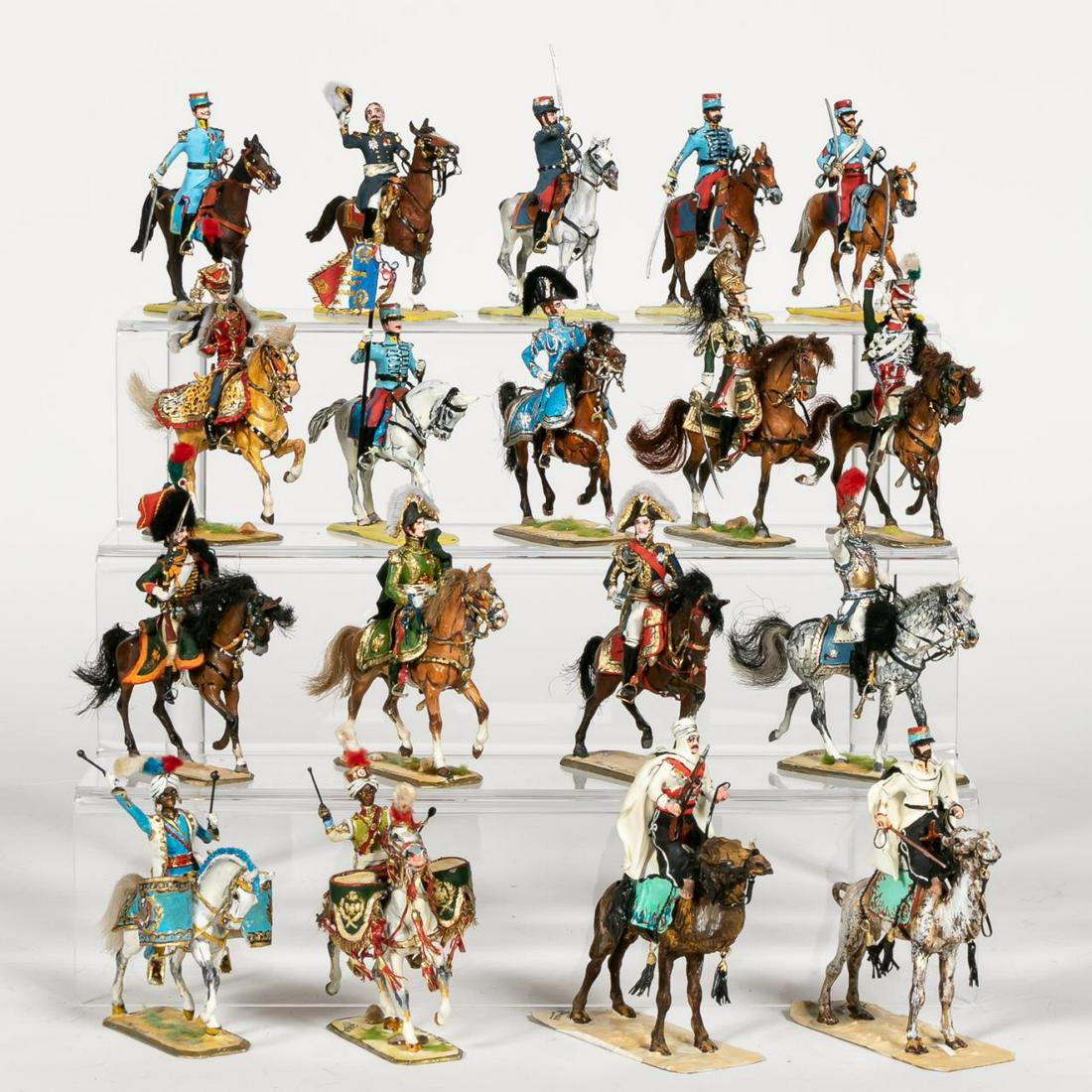18, Exceptionally Hand Painted J. Dulsoy Calvary: 20th century. An eighteen piece grouping ofexceptionally hand painted J. Dulsoy Calvary toysoldiers. Signed J. Dulsoy to the base of each.Approx: h. 3". Provenance: From the Estate of Charles Michael