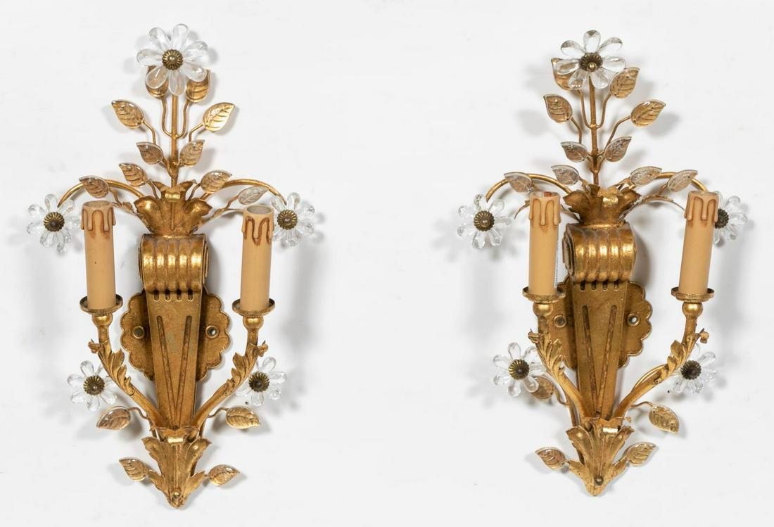 Pair, Baques Style Italian Crystal & Gilt Sconces: Banci (Italian, founded 1899). A pair of two arm gilt brass wall sconces with crystal florets and petals accenting the main body of each in the style of Maison Bagues. Marked "Banci, Made in Italy" to