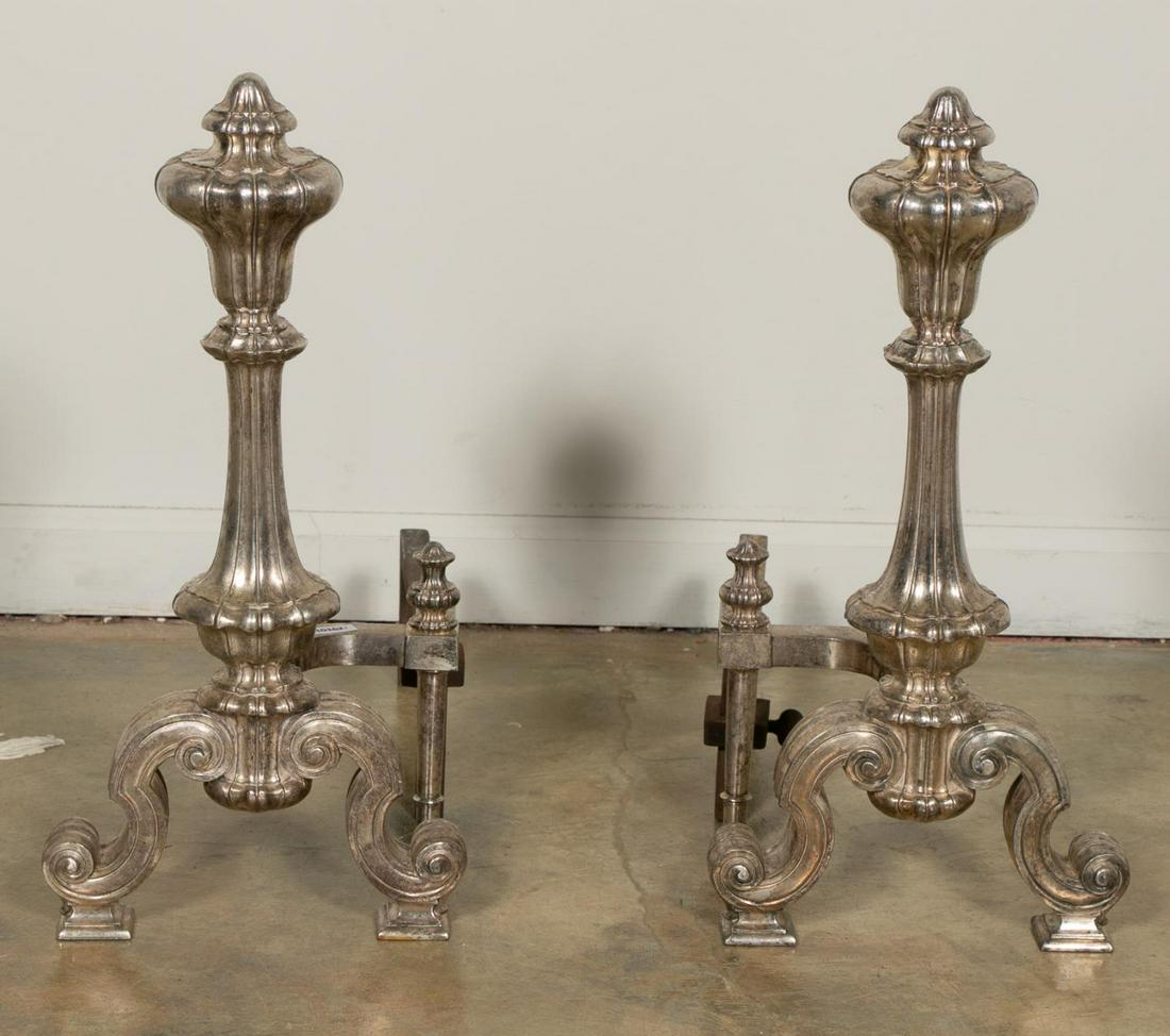 Pair Silver Plated Bronze William Jackson Andirons: William H. Jackson Co. (American, founded 1827). Pair of baroque style silver plated bronze andirons with raised turned feet and fluted columns. Marked "Wm. H. Jackson" to underside of iron stands. Ap