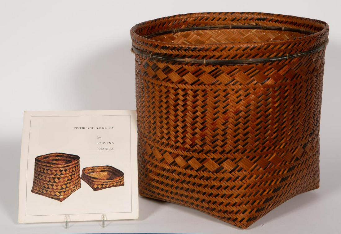 Handwoven River Cane Basket, Attr. Rowena Bradley: Attributed, Rowena Bradley (American/ Eastern Band Cherokee, 1922-2003), last quarter 20th century. Painted and dyed two-tone river cane basket having a circular rim and square base. Unmarked. Approx.